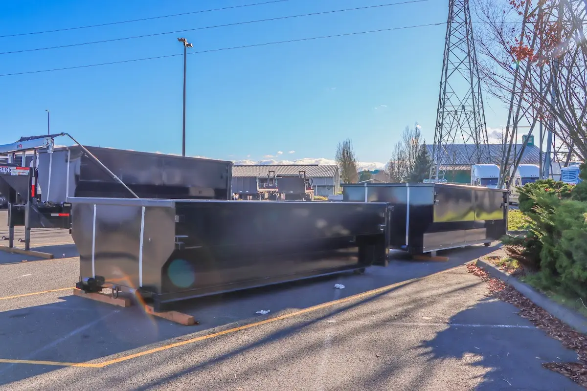 Roll-off dumpster ready for waste disposal at job site for Concrete Dumpster Rental in Bemidji